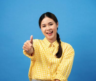 Young asian woman is smile with braid hairstyle after having goo