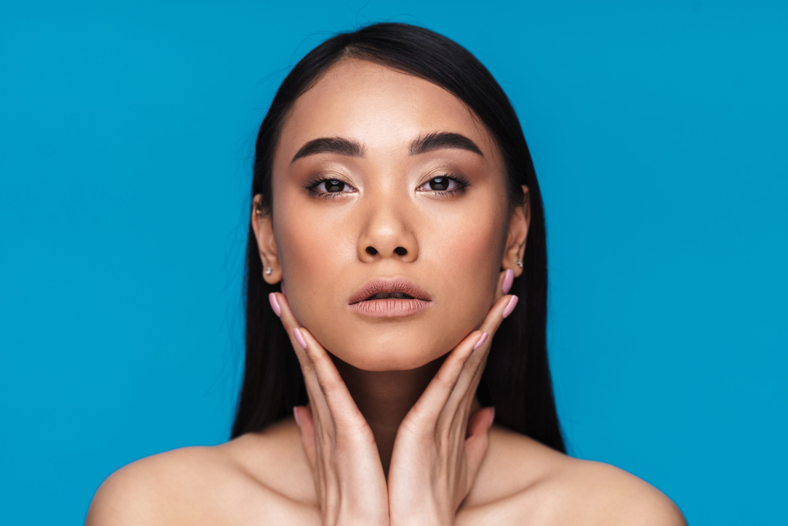 Serious asian young woman